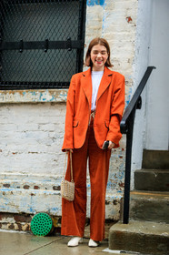corduroy, golden bag, high heels, leather bag, leather shoes, metallic bag, orange jacket, orange pants, paco rabanne, trousers, white boots, white t-shirt, street style, jonathan paciullo, FW, frenchystyle, fashion week, NYFW, NEW YORK, AUTUMN WINTER 2018-2019, AW 18-19, FALL WINTER 2018-2019, FW 18-19, vertical, full length, molly and reese blustein