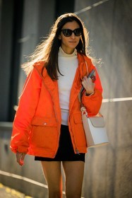 black sunglasses, orange jacket, nylon jacket, white top, rain jacker, white handbag, dual toned handbag, leather bag, black mini skirt, street style, jonathan paciullo, FW, frenchystyle, fashion week, MFW, MILAN, FALL WINTER 2022_2023, AUTUMN WINTER 2022-2023, FW 22-23, vertical, atmosphere details