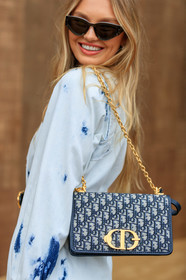 model, romee strijd, dior bag, dior dress, denim, denim dress, tie and dye denim, tie and dye dress, butterfly sunglasses, monogrammed bag, golden chain strap bag, blue bag, close up detail, fashion week, frenchystyle, FW, jonathan paciullo, street style, SPRING SUMMER 2020, SS 20, PFW, PARIS, vertical, atmosphere details, detail