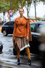 orange jacket, orange boots, black leather boots, high boots, wrap skirt, checked skirt, checked scarf, woolen scarf, striped skirt, brown skirt, plaid skirt, estelle pigault, fashion week, frenchystyle, FW, jonathan paciullo, street style, SPRING SUMMER 2020, SS 20, PFW, PARIS, vertical, full length
