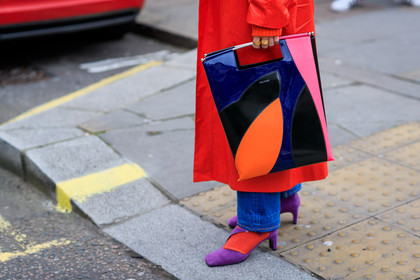 black bag, blue denim, denim pants, graphic bag, high heels, jeans, leather bag, leather shoes, multicolor bag, printed bag, purple shoes, red coat, trousers, street style, jonathan paciullo, FW, frenchystyle, fashion week, LFW, LONDON, AUTUMN WINTER 2018-2019, AW 18-19, FALL WINTER 2018-2019, FW 18-19, horizontal, atmosphere details, detail