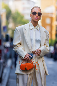 Viktoria Rader, bag, celine bag, cream blazer, cream pants, cream shirt, cream suit, leather bag, orange bag, satin pants, sunglasses, Viktoria Rader, fashion week, frenchystyle, FW, jonathan paciullo, street style, MFW, MILAN, SPRING SUMMER 2022, SS 22, vertical, atmosphere details, detail