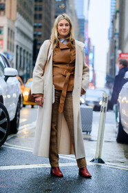 beige coat, brown jacket, brown pants, graphic pants, leather bag, leather jacket, leather shoes, loewe, printed pants, red boots, trousers, street style, jonathan paciullo, FW, frenchystyle, fashion week, NYFW, NEW YORK, AUTUMN WINTER 2018-2019, AW 18-19, FALL WINTER 2018-2019, FW 18-19, vertical, full length, avery blanchard, camille charriere