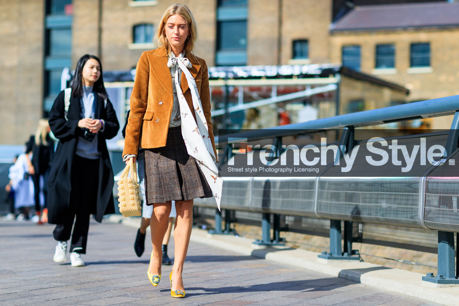atmosphere details, blazer, bow collar, brown jacket, brown skirt, corduroy, emili sindlev, fashion week, frenchystyle, full length, FW, high heels, horizontal, jonathan paciullo, leather bag, leather shoes, LFW, LONDON, pleated skirt, SPRING SUMMER 2018, SS 18, street style, white shirt, yellow bag, yellow shoes