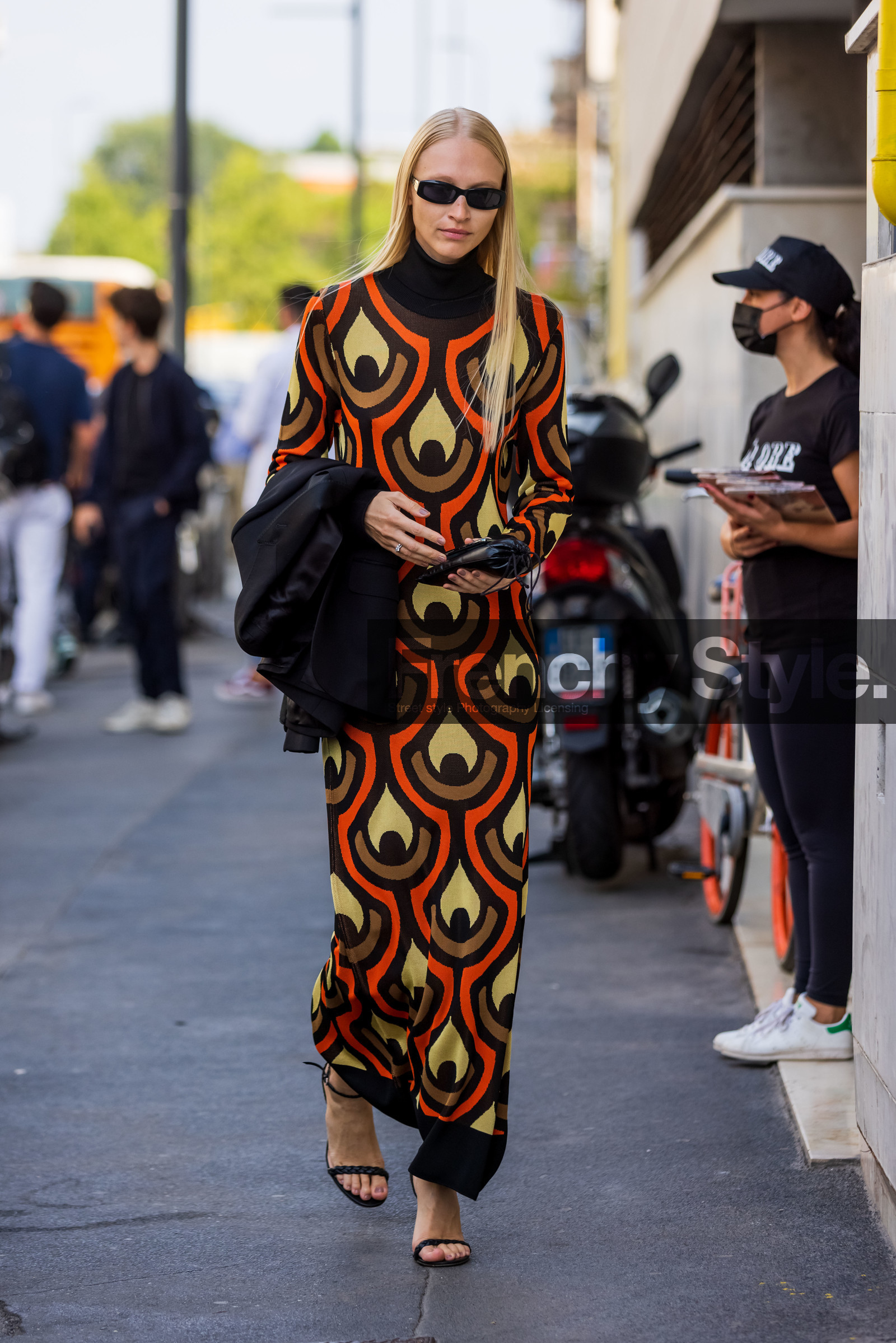 black heels, black jacket, black sunglasses, color, colorful, dress, heels, orange dress, print, printed dress, sunglasses, tube dress, turtleneck, turtleneck dress, 70s, fashion week, frenchystyle, FW, jonathan paciullo, street style, MFW, MILAN, SPRING SUMMER 2022, SS 22, vertical, full length