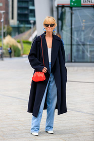 jeanette madsen, round shape earrings, dangling earrings, blue earrings, silvered earrings, red leather bag, shoulder bag, plaited bag, bottega veneta bag, navy blue coat, light blue jeans, loose jeans, fashion week, frenchystyle, FW, jonathan paciullo, street style, vertical, full length, MFW, MILAN, SPRING SUMMER 2020, SS 20