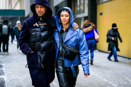 black bag, black coat, black pants, blue jacket, down jacket, earrings, fanny pack, hood, leather bag, leather jacket, leather pants, leather perfecto, sunglasses, trousers, street style, jonathan paciullo, frenchystyle, NYFW, NEW YORK, AUTUMN WINTER 2019-2020, AW 19-20, FALL WINTER 2019-2020, FW 19-20, FW, fashion week, atmosphere details, horizontal, detail