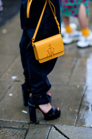 black denim, black shoes, denim pants, high heels, jeanette madsen, jeans, jw anderson, leather bag, leather shoes, trousers, velvet, yellow bag, LONDON, LFW, fashion week, frenchystyle, FW, jonathan paciullo, street style, AUTUMN WINTER 2019-2020, AW 19-20, FW 19-20, FALL WINTER 2019-2020, vertical, atmosphere details, detail
