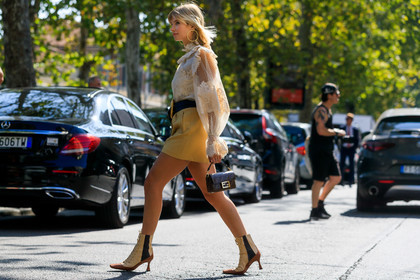 white blouse, lace blouse, ruffle blouse, high collar blouse, bottega veneta belt, big belt, big buckle belt, light yellow shorts, fendi baguette bag, fendi bag, hand bag, monogrammed bag, brown leather bag, beige leather boots, camel leather boots, laced boots, high heels boots, squared toed shoes, plumetis blouse, polka dots blouse, fashion week, frenchystyle, FW, jonathan paciullo, street style, horizontal, atmosphere details, full length, MFW, MILAN, SPRING SUMMER 2020, SS 20