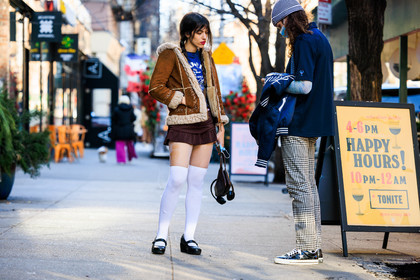 school girl style, high knee white socks, black derbies, mini brozn skirt, blue tshirt print, brown furry jacket, mini brown bag, blue converse, blue knitted striped beanie, fashion week, frenchystyle, FW, jonathan paciullo, street style, NYFW, NEW YORK, AUTUMN WINTER 2022-2023, FALL WINTER 2022_2023, FW 22-23, atmosphere details, horizontal, full length