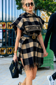 model, romee strijd, checked dress, checked cape, checked jacket, checked hoodie, beige cape, beige hoodie, beige jacket, black jacket, black hoodie, black cape, fringe cape, fringe jacket, short sleeves jacket, short sleeves hoodie, belted jacket, belted dress, belted cape, belted hoodie, beige dress, black dress, fringe dress, black bag, monogrammed bag, hand bag, dior bag, dior cape, dior belt, dior hoodie, dior jacket, dior dress, dior sunglasses, dior earrings, big sunglasses, scale sunglasses, square shape glasses, black leather belt, pearl earrings, dior total look, fashion week, frenchystyle, FW, jonathan paciullo, street style, PFW, PARIS, AUTUMN WINTER 2020-2021, FALL WINTER 2020-2021, FW 20-21, vertical, atmosphere details, detail