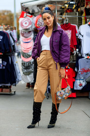 tamara kalinic, purple jacket, purple bombers, white top, low necked top, beige pants, hoop earrings, louis vuitton earrings, golden earrings, silvered watch, man style watch, fendi bag, fendi baguette bag, hand bag, printed bag, high boots, high heels boots, black suede boots, sharp end boots, studs boots, cropped pants, fashion week, frenchystyle, FW, jonathan paciullo, street style, SPRING SUMMER 2020, SS 20, PFW, PARIS, vertical, full length