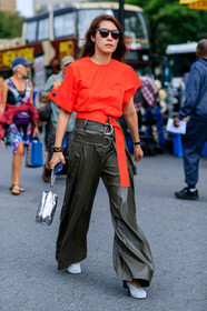 bracelet, green pants, high heels, leather pants, leather shoes, red shirt, shiny bag, silver bag, sunglasses, trousers, white shoes, street style, jonathan paciullo, FW, frenchystyle, fashion week, NEW YORK, NYFW, SPRING SUMMER 2020, SS 20, vertical, full length