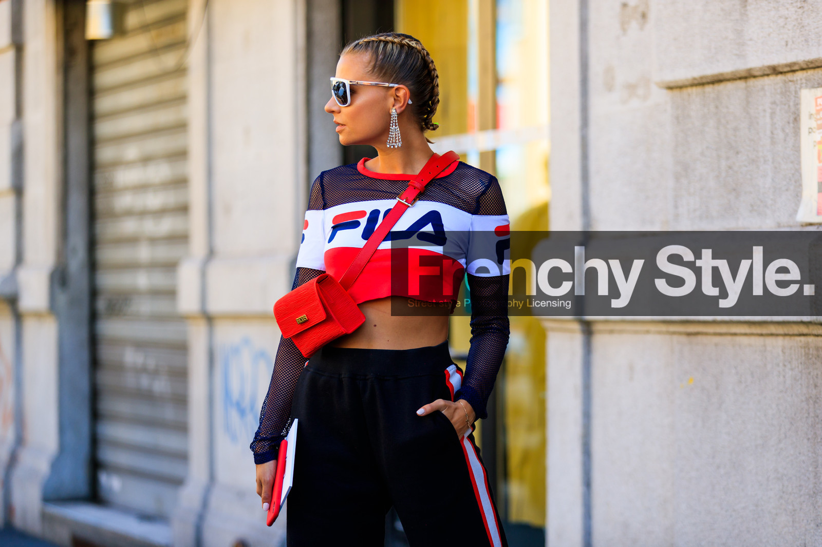 basketball jersey, black pants, braids, crop top, earrings, fila, fishnet, leather bag, red bag, sunglasses, sweatpants, trousers, veronia ferr, veronica ferraro, street style, jonathan paciullo, FW, frenchystyle, fashion week, MFW, MILAN, SPRING SUMMER 2019, SS 19, atmosphere details, horizontal, detail