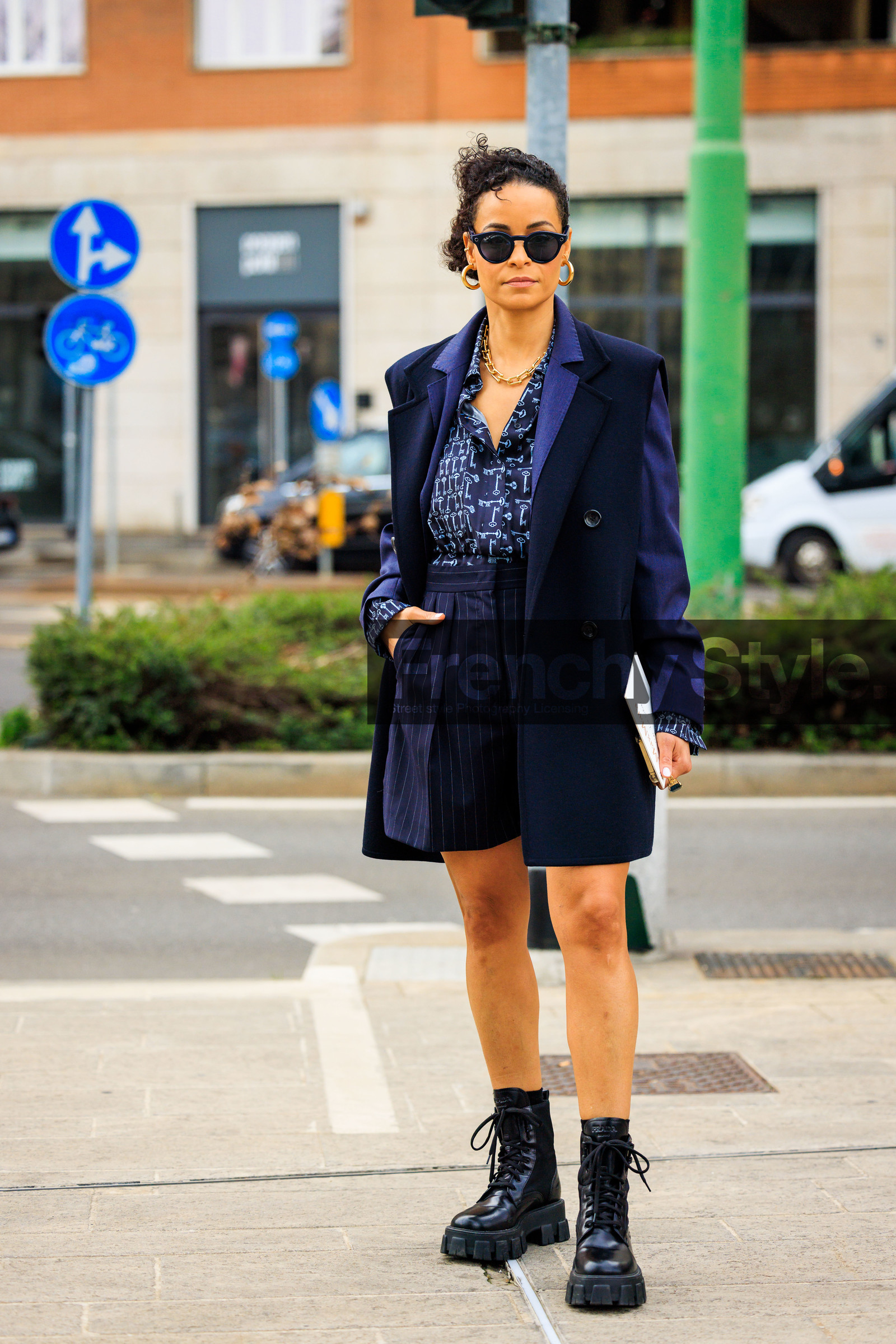black sunglasses, leather boots, prada boots, black combat boots, golden loops, creole earrings, sleeveless vest, sleeveless blue vest, buttones vest, light blue shirt, blue shorts, max mara shirt, chain necklace, curly hair, street style, jonathan paciullo, FW, frenchystyle, fashion week, MFW, MILAN, FALL WINTER 2022_2023, AUTUMN WINTER 2022-2023, FW 22-23, vertical, full length