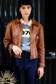 devon ross, brown leather jacket, zipped jacket, navy blue pants, striped pants, grey pullover, numbers printed pullover, printed pullover, black bag, velvet bag, shopping bag, tote bag, embroidered bag, sequins bag, golden bag, letter embroidered bag, fashion week, frenchystyle, FW, jonathan paciullo, street style, PFW, PARIS, SPRING SUMMER 2021, SS 21, vertical, atmosphere details, detail, model