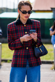 black bag, black sunglasses, check, Darja Igorewna Kljukina, denim, jacket, jeans, large denim, large jeans, leather bag, print, red check, red tartan, small bag, smartphone, sunglasses, tartan jacket, fashion week, frenchystyle, FW, jonathan paciullo, street style, MFW, MILAN, SPRING SUMMER 2022, SS 22, vertical, atmosphere details, detail