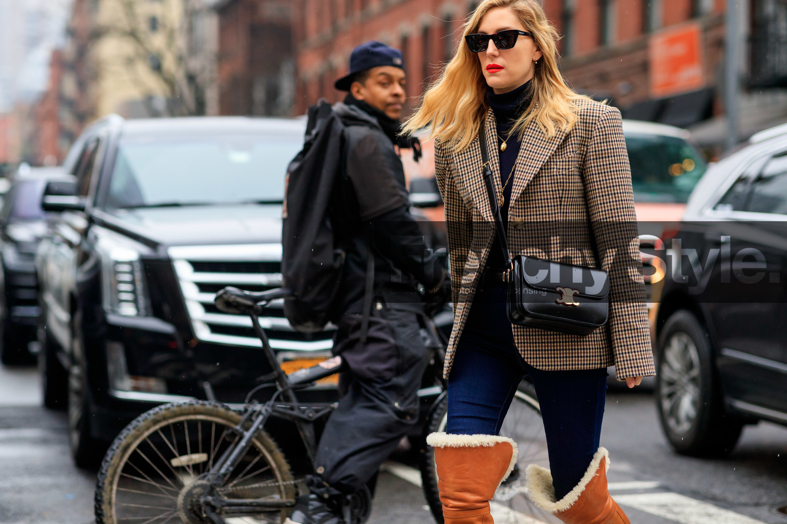 joanna hillman, checked jacket, beige jacket, black leather bag, celine bag, crossbody bag, camel leather boots, high boots, fur boots, blue jeans, denim, brown jacket, long necklace, multi necklace, golden necklace, red lipstick, black sunglasses, futurist shape sunglasses, saint laurent sunglasses, fashion week, frenchystyle, FW, jonathan paciullo, street style, NYFW, NEW YORK, AUTUMN WINTER 2020-2021, FALL WINTER 2020-2021, FW 20-21, horizontal, atmosphere details, detail