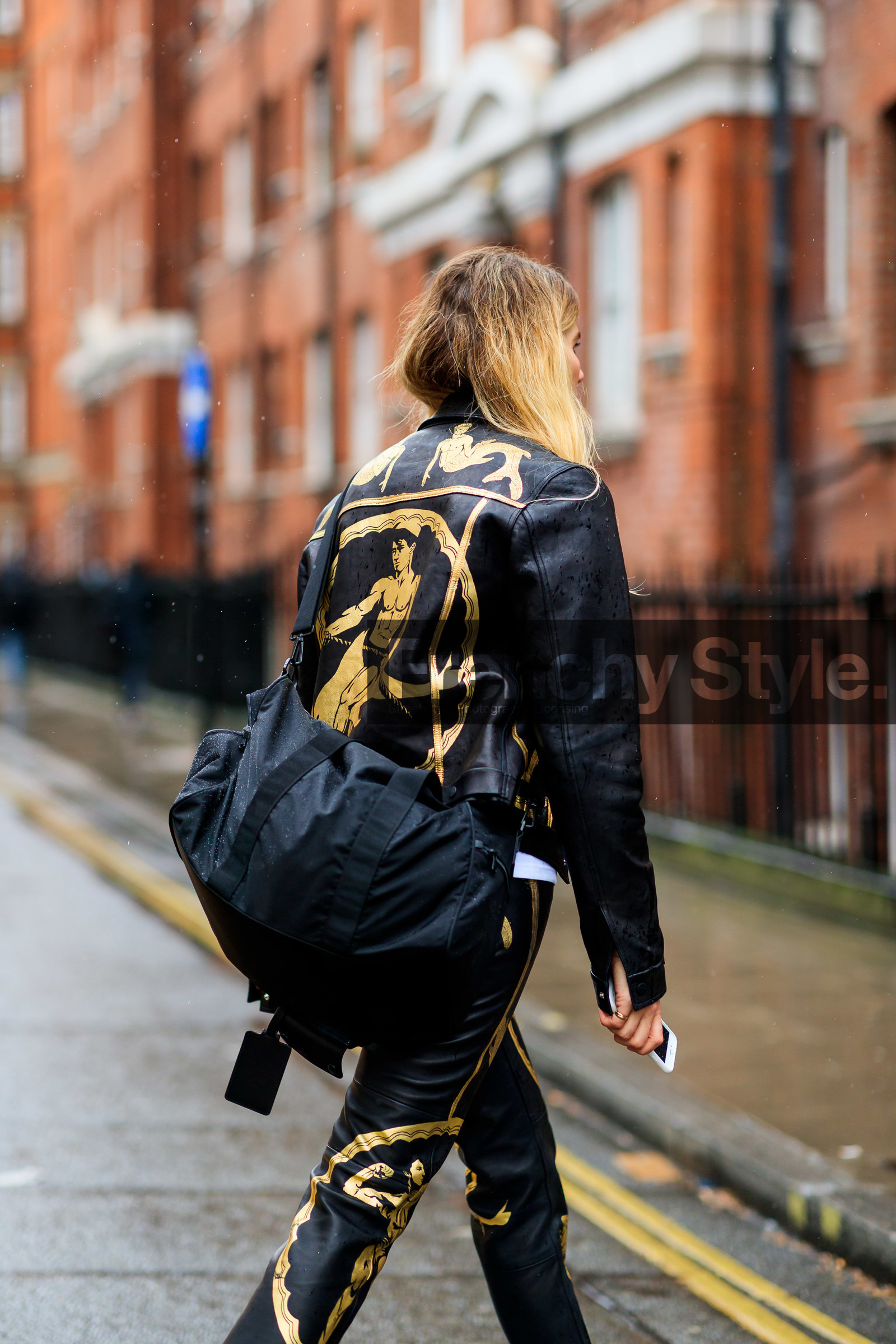 black bag, black jacket, black pants, graphic jacket, graphic pants, leather bag, leather jacket, leather pants, printed jacket, printed pants, trousers, veronika heilbrunner, LONDON, LFW, fashion week, frenchystyle, FW, jonathan paciullo, street style, AUTUMN WINTER 2019-2020, AW 19-20, FW 19-20, FALL WINTER 2019-2020, vertical, atmosphere details, detail