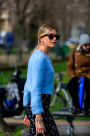 camille charriere, light blue cardigan, mohair cardigan, button cardigan, strassed cardigan, strassed pants, black pants, tight pants, rayban sunglasses, strassed earrings, round shape earrings, logo earrings, close up detail, chanel cardigan, chanel pants, chanel earrings, fashion week, frenchystyle, FW, jonathan paciullo, street style, PFW, PARIS, vertical, atmosphere details, detail