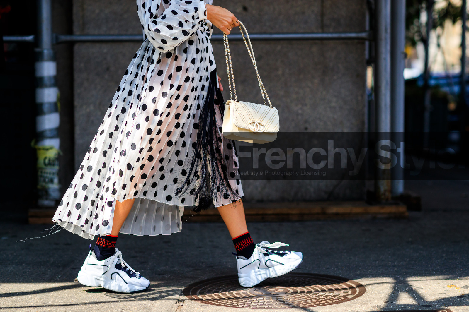 atmosphere details, black socks, chanel, courtney trop, detail, fashion week, frenchystyle, FW, graphic dress, horizontal, jonathan paciullo, leather bag, leather shoes, NEW YORK, NYFW, pleated dress, polka dot, printed dress, SPRING SUMMER 2018, SS 18, street style, white bag, white dress, white sneakers