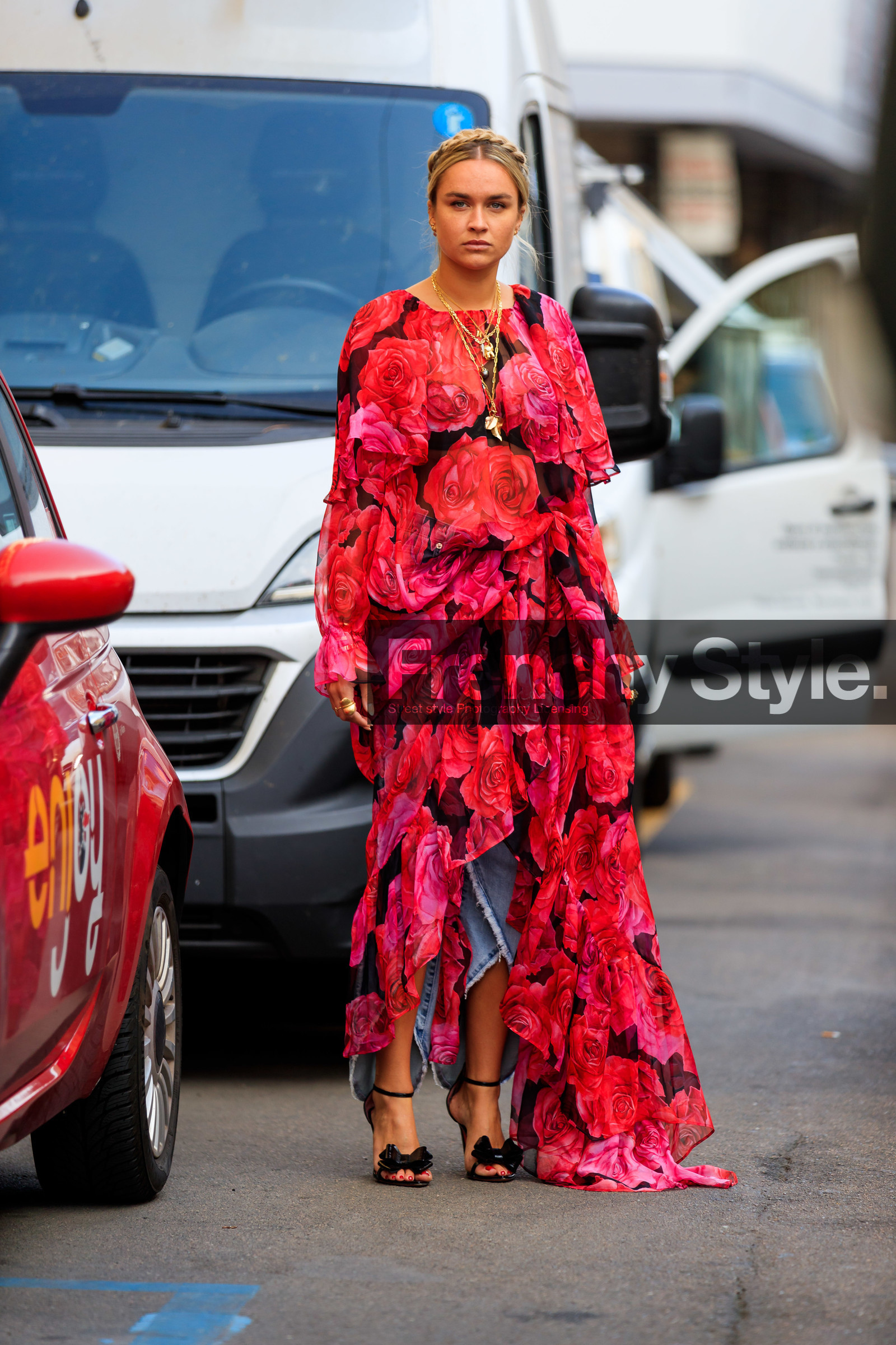 nina suess, plaited hair, multi necklace, chain necklace, charms necklace, floral printed blouse, red blouse, pink blouse, ruffle blouse, light blue jeans, split pants, black sandals, knot details shoes, drape blouse, fashion week, frenchystyle, FW, jonathan paciullo, street style, vertical, full length, MFW, MILAN, SPRING SUMMER 2020, SS 20
