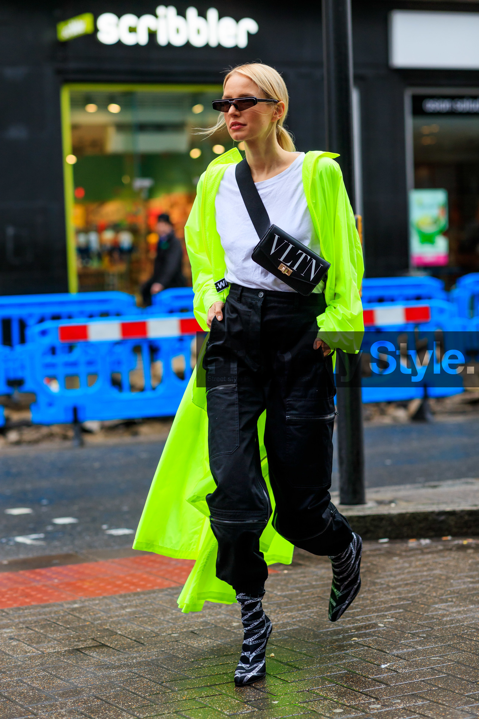 balenciaga, black and white shoes, black bag, black pants, black shoes, fanny pack, graphic bag, green coat, high heels, leather bag, leather shoes, leonie hanne, neon, printed bag, rain coat, sunglasses, trousers, valentino, white t shirt, LONDON, LFW, fashion week, frenchystyle, FW, jonathan paciullo, street style, AUTUMN WINTER 2019-2020, AW 19-20, FW 19-20, FALL WINTER 2019-2020, vertical, full length