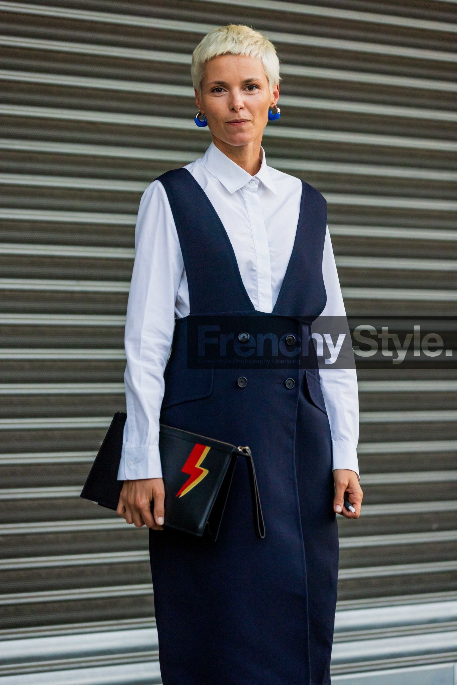 apron dress, black dress, black pouch, blue earrings, flame, leather pouch, white shirt, fashion week, frenchystyle, FW, jonathan paciullo, street style, MFW, MILAN, SPRING SUMMER 2022, SS 22, vertical, atmosphere details, detail