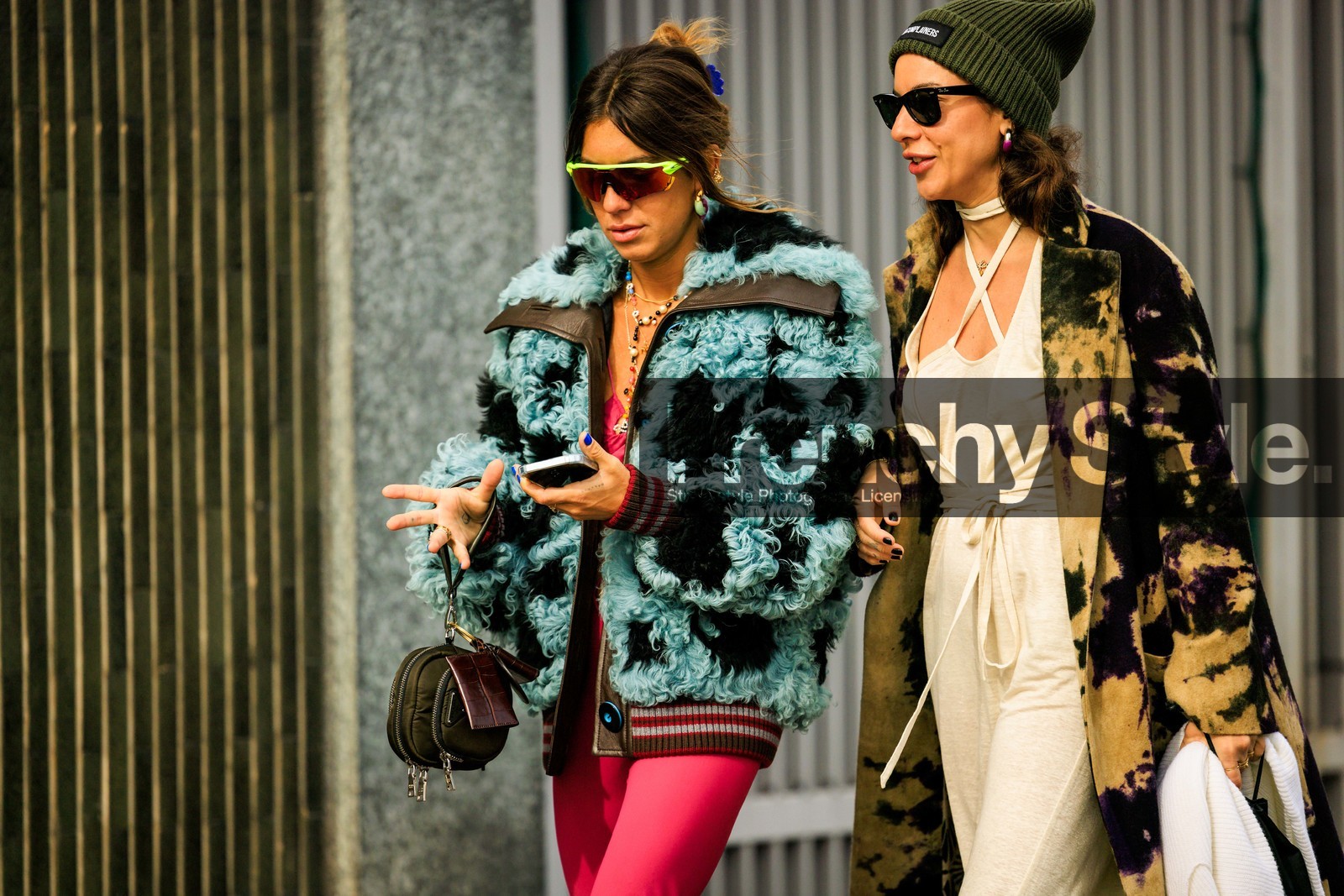 printed trench, mutlicolor trench, chunky shoes, lpunk look, cut out top, cut out dress, green beanie, black sunglasses, ski sunglasses, pink sunglasses, furry jacket, fluffy jacket, dual toned jacket, winter jacket, blue jacket, loops, closeup, street style, jonathan paciullo, FW, frenchystyle, fashion week, MFW, MILAN, FALL WINTER 2022_2023, AUTUMN WINTER 2022-2023, FW 22-23, horizontal, atmosphere details