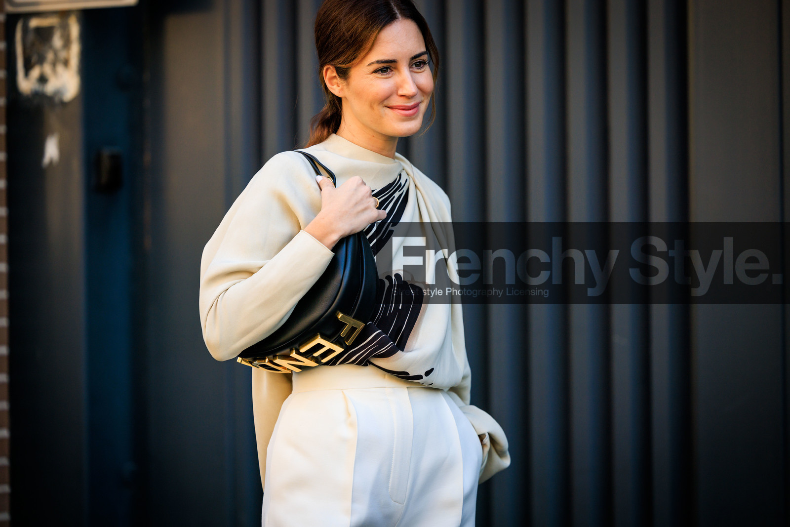 fendi handbag, black handbag, leather handbag, fendi black bag, white trousers, highwaist pants, burgundy shoes, cream pleated top, minimal look, printed top, close up, gala gonzalez, fashion week, frenchystyle, FW, jonathan paciullo, street style, MFW, MILAN, FALL WINTER 2022_2023, AUTUMN WINTER 2022-2023, FW 22-23, horizontal, atmosphere details