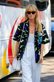 jeanette madsen, prada shirt, short sleeves shirt, printed shirt, black shirt, purple shirt, green shirt, loose shirt, loose pants, white pants, tailored pants, white leather bag, shoulder bag, marni bag, white top, black sunglasses, hoop earrings, golden earrings, golden necklace, chain necklace, chain earrings, multi earrings, multi necklace, fashion week, frenchystyle, FW, jonathan paciullo, street style, vertical, atmosphere details, detail, MFW, MILAN, SPRING SUMMER 2020, SS 20