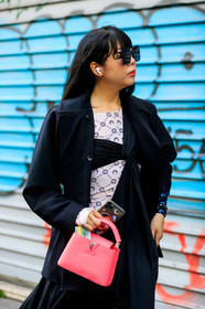 susie lau, black coat, black bra, black dress, white dress, monogrammed dress, bicolor dress, pink leather bag, hand bag, louis vuitton bag, marine serre dress, dior sunglasses, big sunglasses, square shape glasses, airpod, drape dress, fashion week, frenchystyle, FW, jonathan paciullo, street style, PFW, PARIS, AUTUMN WINTER 2020-2021, FALL WINTER 2020-2021, FW 20-21, vertical, atmosphere details, detail
