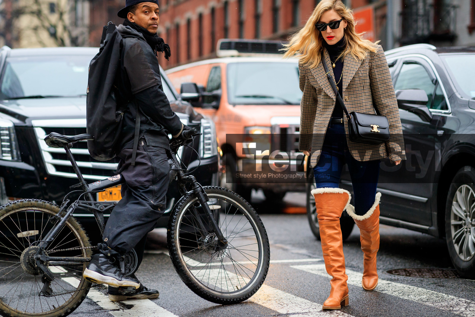 joanna hillman, checked jacket, beige jacket, black leather bag, celine bag, crossbody bag, camel leather boots, high boots, fur boots, blue jeans, denim, brown jacket, long necklace, multi necklace, golden necklace, red lipstick, black sunglasses, futurist shape sunglasses, saint laurent sunglasses, flat boots, fashion week, frenchystyle, FW, jonathan paciullo, street style, NYFW, NEW YORK, AUTUMN WINTER 2020-2021, FALL WINTER 2020-2021, FW 20-21, horizontal, atmosphere details, full length