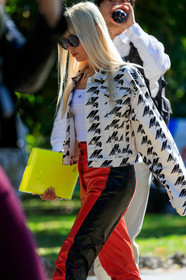 msgm jacket, white denim jeacket, printed jacket, letter printed jacket, monogrammed jacket, red leather pants, black leather pants, black sunglasses, msgm necklace, diamond necklace, fashion week, frenchystyle, FW, jonathan paciullo, street style, vertical, atmosphere details, detail, MFW, MILAN, SPRING SUMMER 2020, SS 20