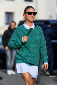 sophia roe, green pullover, white polo shirt, white skirt, celine sunglasses, black sunglasses, butterfly sunglasses, mini skirt, pleated skirt, lacoste pullover, lacoste skirt, lacoste polo shirt, lacoste total look, fashion week, frenchystyle, FW, jonathan paciullo, street style, PFW, PARIS, vertical, atmosphere details, detail