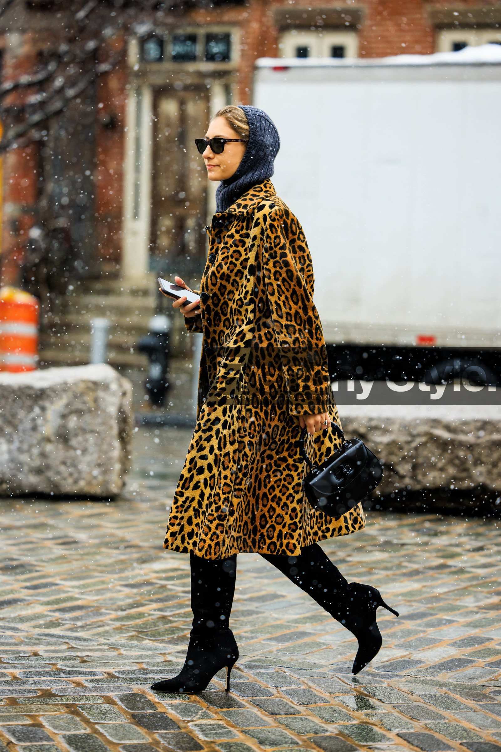 leopard print coat, animal print coat, furry winter look, dark sunglasses, black pants, black bamboo bag, gucci bamboo bag, gucci handbag, knit headcover, winter outwear, animal print look, black boots, jenny walton, fashion week, frenchystyle, FW, jonathan paciullo, street style, NYFW, NEW YORK, AUTUMN WINTER 2022-2023, FALL WINTER 2022_2023, FW 22-23, vertical, full length