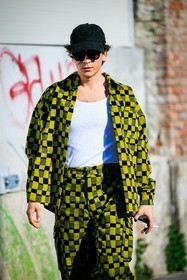black cap: white tank top, print suit, checkered suit, black and yelllow suit, printed jacket, printed pants, white sneakers, fashion week, frenchystyle, FW, jonathan paciullo, street style, vertical, atmosphere details, detail