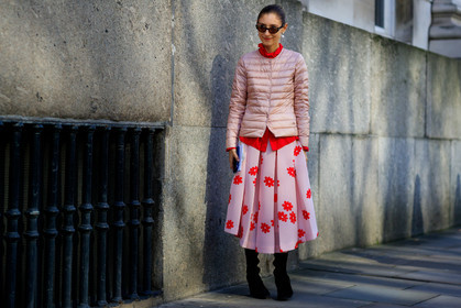 black shoes, down jacket, earrings, flowers, graphic skirt, high heels, leather shoes, pink skirt, pleated skirt, printed skirt, red shirt, sunglasses, street style, jonathan paciullo, FW, frenchystyle, fashion week, LFW, LONDON, AUTUMN WINTER 2018-2019, AW 18-19, FALL WINTER 2018-2019, FW 18-19, horizontal, atmosphere details, full length, jenny walton