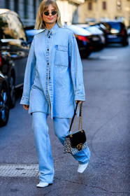 xnenia adonts, denim, denim total look, denim shirt, light blue jeans, metalic frame sunglasses, futurist shape sunglasses, ferragamo bag, chain strap bag, monogrammed bag, long shirt, flare jeans, fashion week, frenchystyle, FW, jonathan paciullo, street style, vertical, full length, MFW, MILAN, SPRING SUMMER 2020, SS 20