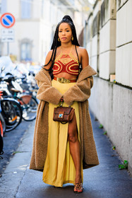 belt sandals; almond coat; furry coat; long trousers; knitted top; etro; braid; dual toned top; knitwear; golden loops; buckle belt; brown belt; yellow pants; flared pants