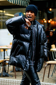 asap rocky, black leather coat, black leather pants, monogrammed coat, monogrammed pants, zipped coat, down jacket, black hat, woolen hat, marine serre coat, marine serre look, marine serre pants, letter ring, fashion week, frenchystyle, FW, jonathan paciullo, street style, PFW, PARIS, AUTUMN WINTER 2020-2021, FALL WINTER 2020-2021, FW 20-21, vertical, atmosphere details, detail
