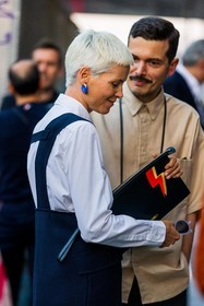 bicolor earrings, black dress, black pouch, blue earrings, flame, leather pouch, white shirt, fashion week, frenchystyle, FW, jonathan paciullo, street style, MFW, MILAN, SPRING SUMMER 2022, SS 22, vertical, atmosphere details, detail
