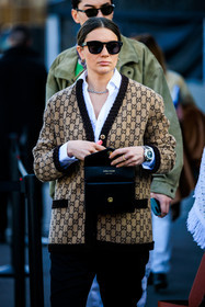 gucci cardigan, logo gucci cardigan, monogram cardigan, black handbag, leather handbag, black bag, black sunglasses, white shirt, silver loops, watch, black trousers, gucci, street style, jonathan paciullo, FW, frenchystyle, fashion week, MFW, MILAN, FALL WINTER 2022_2023, AUTUMN WINTER 2022-2023, FW 22-23, vertical, atmosphere details