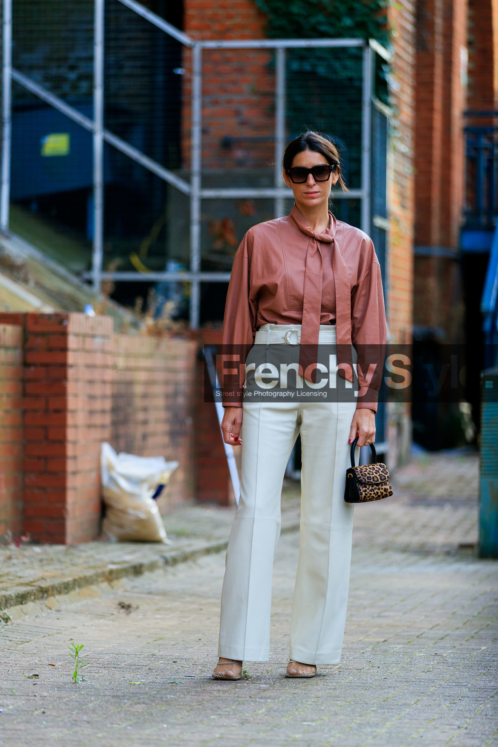 deborah reyner sebag, leather shirt, brown leather shirt, lavalliere collar, white leather pants, high waist pants, belted pants, flare pants, square shape glasses, celine sunglasses, hand bag, animal printed bag, bottega veneta shoes, white leather shoes, squared toed shoes, chain detail shoes, fur bag, fashion week, frenchystyle, FW, jonathan paciullo, street style, vertical, full length