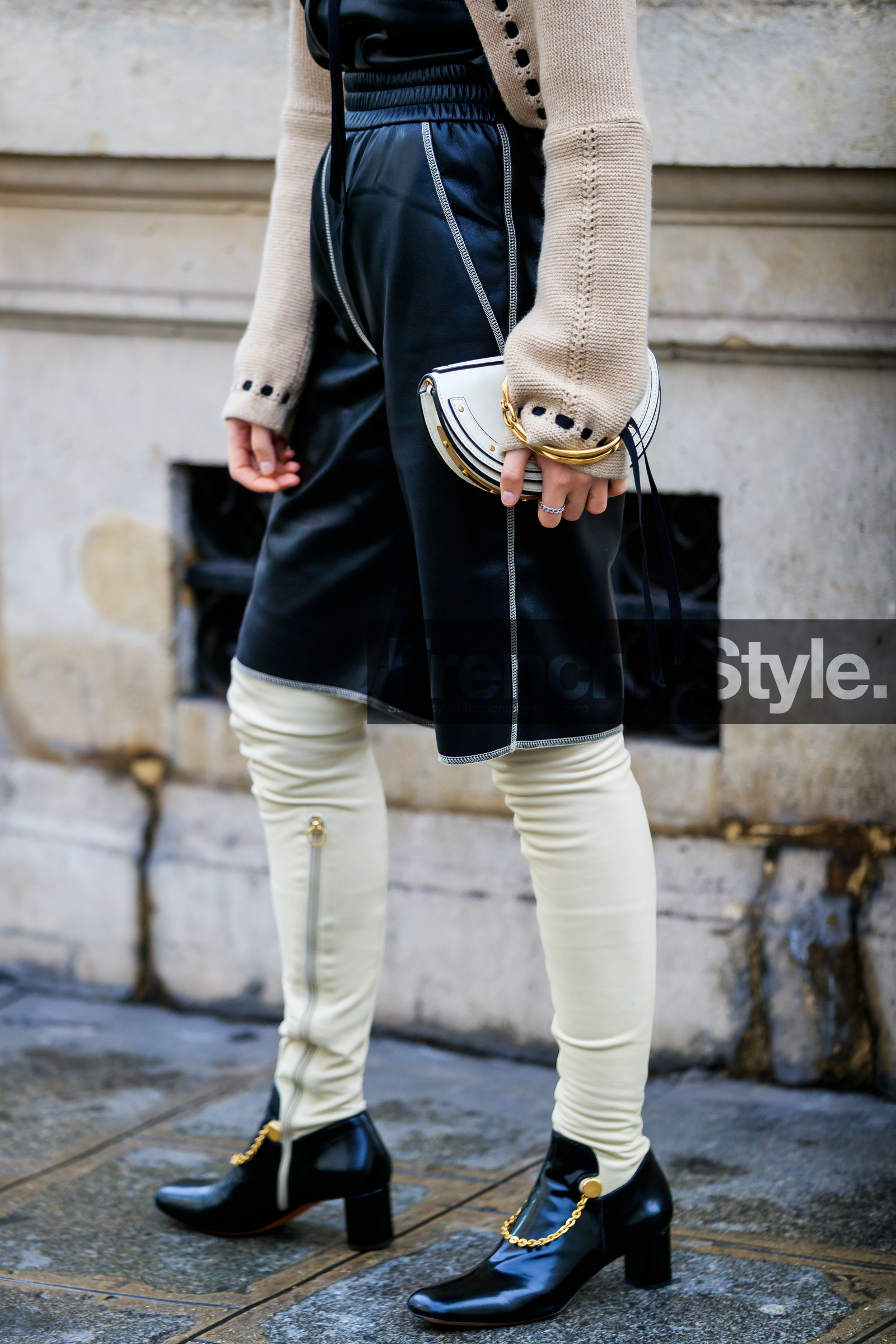 xenia adonts, black leather bermuda shorts, black leather shirt, black leather boots, white leather bag, white leather clutch, white leather boots, high boots, high heels boots, tight boots, beige pullover, cropped pullover, laced pullover, chloe bag, close up detail, bag detail, legs detail, shoes detail, fashion week, frenchystyle, FW, jonathan paciullo, street style, PFW, PARIS, AUTUMN WINTER 2020-2021, FALL WINTER 2020-2021, FW 20-21, vertical, atmosphere details, detail
