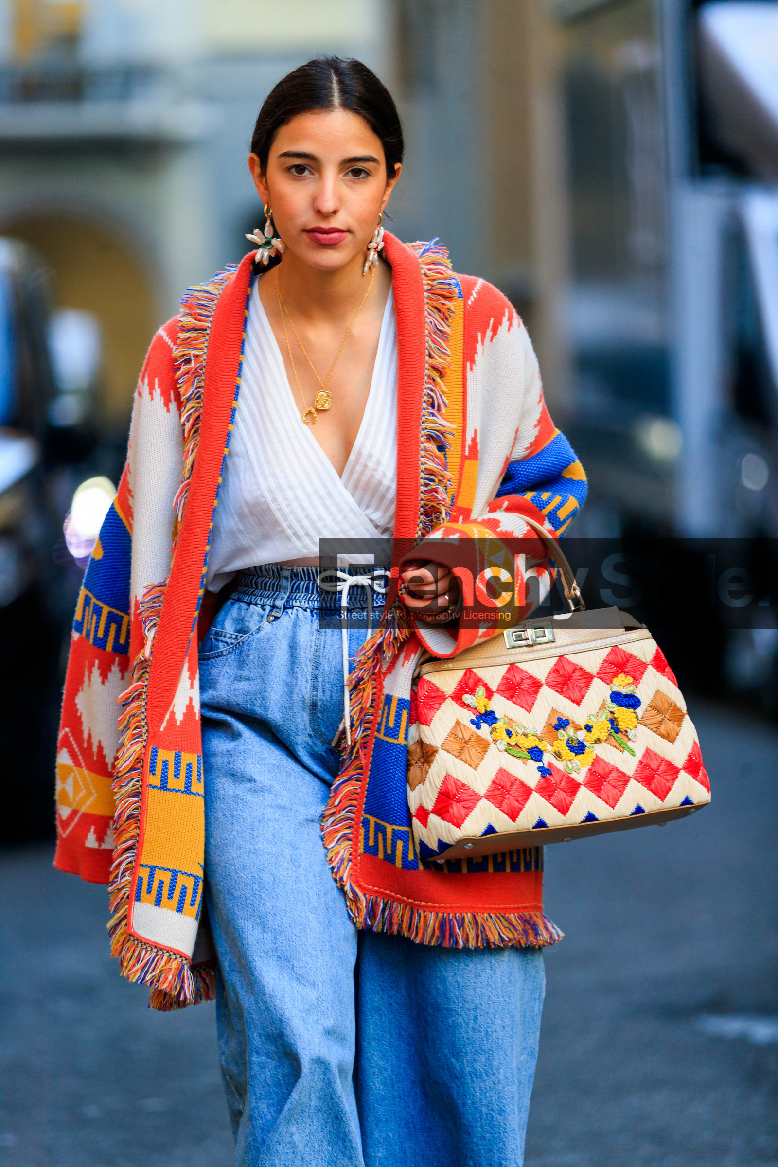 bettina looney, blue denim, denim pants, earrings, fendi, geometric, graphic bag, graphic jacket, jeans, leather bag, multicolor bag, multicolor jacket, poncho, printed bag, printed jacket, trousers, white top, MILAN, MFW, fashion week, frenchystyle, FW, jonathan paciullo, street style, AUTUMN WINTER 2019-2020, AW 19-20, FALL WINTER 2019-2020, FW 19-20, vertical, atmosphere details, detail