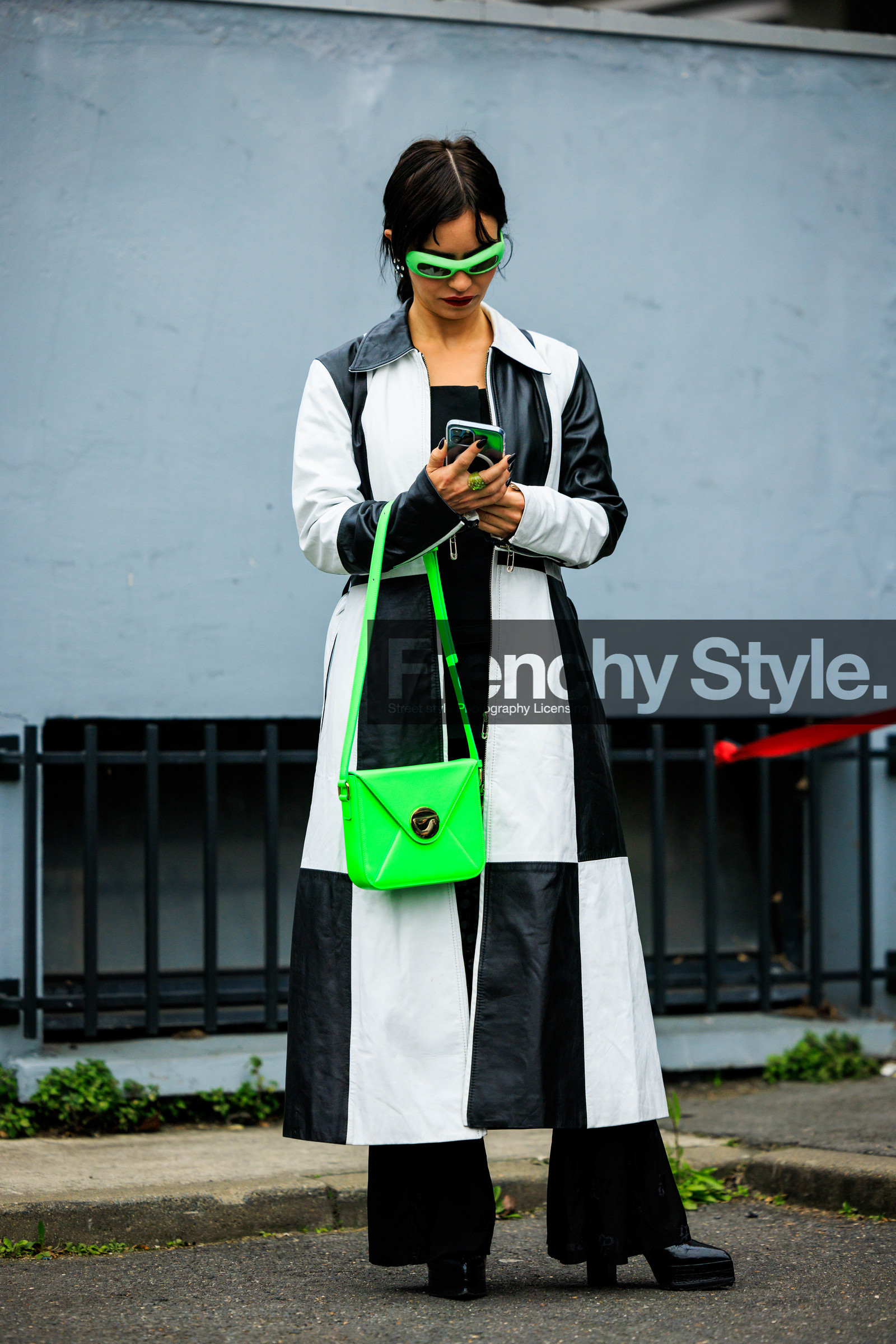 fluo green sunglasses, fluo green handbag: dual toned coat, leather coat, chess motif coat, black and white coat, black platform boots, flared pants, black pants, coperni, street style, jonathan paciullo, FW, frenchystyle, fashion week, AUTUMN WINTER 2022-2023, FALL WINTER 2022_2023, FW 22-23, PFW, PARIS, full length, vertical