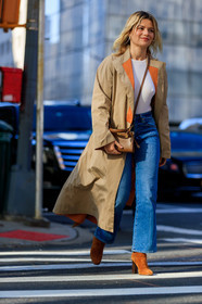 sabina socol, beige trench coat, camel suede boots, brown leather bag, crossbody bag, tory burch bag, blue jeans, cropped jeans, flare jeans, white top, orange trench coat, fashion week, frenchystyle, FW, jonathan paciullo, street style, FALL WINTER 2020-2021, AUTUMN WINTER 2020-2021, FW 20-21, vertical, full length, NYFW, NEW YORK