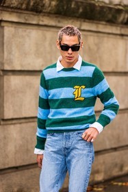 black sunglasses, blue denim, blue jeans, blue jumper, blue knitwear, color, denim, Evan Mock, green jumper, green knitwear, jeans, jumper, knitwear, lacoste look, menswear, ring, sunglasses, white shirt, lacoste, fashion week, frenchystyle, FW, jonathan paciullo, street style, PFW, PARIS, SPRING SUMMER 2022, SS 22, vertical, atmosphere details