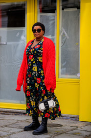gabriella karefa johnson, red cardigan, red dress, black dress, yellow dress, multicolor dress, low necked dress, floral printed dress, square shape glasses, big sunglasses, black sunglasses, black leather bag, black leather boots, flat boots, chelsea boots, white leather bag, bicolor bag, long dress, prada bag, golden earrings, dangling earrings, animal shape earrings, fashion week, frenchystyle, FW, jonathan paciullo, street style, PFW, PARIS, vertical, full length